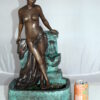 Lady on Wall fountain Bronze Statue -  Size: 12"L x 9"W x 21"H.