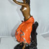 Lady Holds a Bird Up Bronze Statue -  Size: 7"L x 7"W x 20"H.