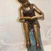 Girl Sitting on a Tree Stump Reading a Book Bronze Statue -  15"L x 17"W x 38"H