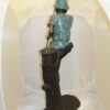 Boy Sitting on a Tree and Fishing Bronze Statue -  Size: 36"L x 21"W x 37"H.