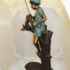 Boy Sitting on a Tree and Fishing Bronze Statue -  Size: 36"L x 21"W x 37"H.