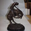 Rattlesnake by Remington Bronze Statue -  Size: 17"L x 10"W x 25"H.