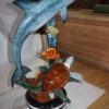 Dolphin with two fish and one turtle Statue -  Size: 22"L x 12"W x 32"H.