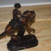 Remington Cowboy on marble Bronze Statue -  Size: 10"L x 3.5"W x 10"H.