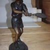 Girl Playing Tennis - Bronze Statue -  Size: 10"L x 11"W x 21"H.