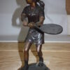 Girl Playing Tennis - Bronze Statue -  Size: 10"L x 11"W x 21"H.