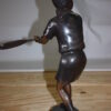 Girl Playing Tennis - Bronze Statue -  Size: 10"L x 11"W x 21"H.