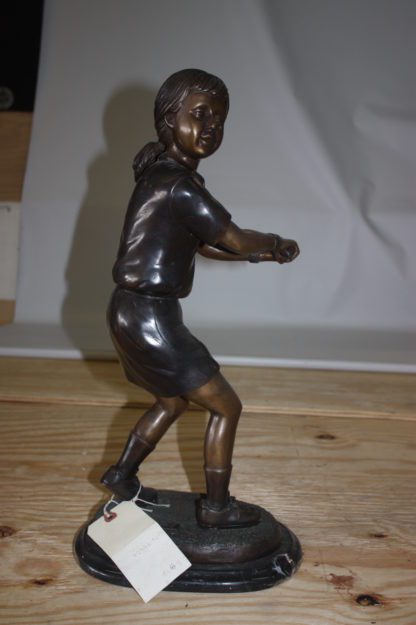 Girl Playing Tennis - Bronze Statue -  Size: 10"L x 11"W x 21"H.