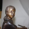 Girl Playing Tennis - Bronze Statue -  Size: 10"L x 11"W x 21"H.