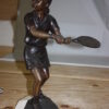 Girl Playing Tennis - Bronze Statue -  Size: 10"L x 11"W x 21"H.