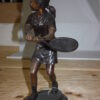 Girl Playing Tennis - Bronze Statue -  Size: 10"L x 11"W x 21"H.