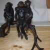 Three monkeys on a tree log - Bronze Statue -  Size: 27"L x 11"W x 18"H.