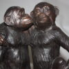 Three monkeys on a tree log - Bronze Statue -  Size: 27"L x 11"W x 18"H.