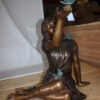 Girl with butterflies  - Bronze Statue -  Size: 27"L x 17"W x 24"H.