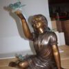 Girl with butterflies  - Bronze Statue -  Size: 27"L x 17"W x 24"H.