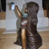 Girl with butterflies  - Bronze Statue -  Size: 27"L x 17"W x 24"H.