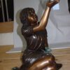 Girl with butterflies  - Bronze Statue -  Size: 27"L x 17"W x 24"H.