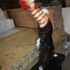 Standing clown with flowers - Bronze Statue -  Size: 21"L x 10.5"W x 38"H.