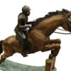 Jockey and Horse Jump a Fence Bronze Statue -  Size: 60"L x 30"W x 51"H.