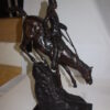 Mountain man Bronze by Fredrick Remington -  Size: 20"L x 8"W x 27"H.