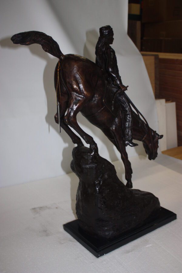 Mountain man Bronze by Fredrick Remington -  Size: 20"L x 8"W x 27"H.