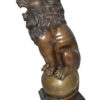 Pair of lions standing on balls, bronze statues -  Size: 14"L x 16"W x 38"H.