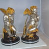 Cupid Girl On A Rock Bronze Statue  -  Size: 20"L x 15"W x 25"H.