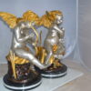 Cupid Girl On A Rock Bronze Statue  -  Size: 20"L x 15"W x 25"H.