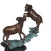 Two Rams on a rock Bronze Statue -  Size: 15"L x 8"W x 16"H.