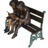 Two kids on bench reading a book - Bronze Statue -  Size: 9"L x 6"W x 8"H.