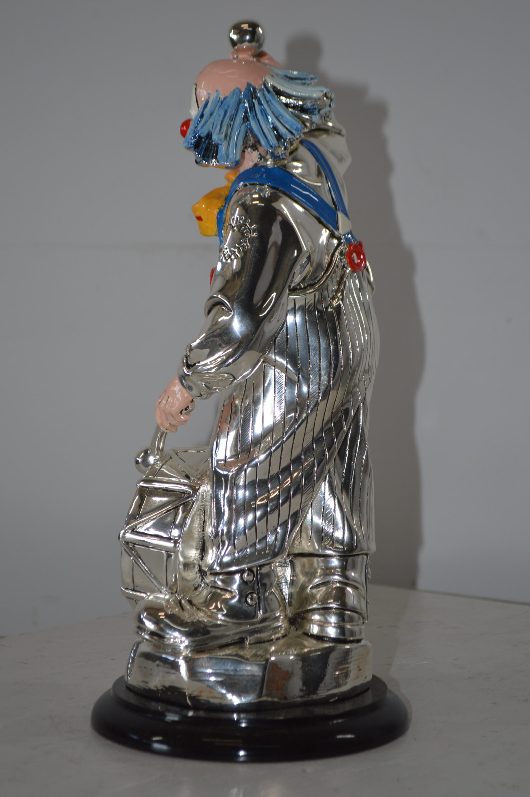 Clown Plays the Drams Resin Statue Silver finish - Size: 6L x 6W x 16H.